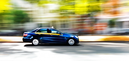 Car in blurred motion on road. Abstract background. Speed.の写真素材
