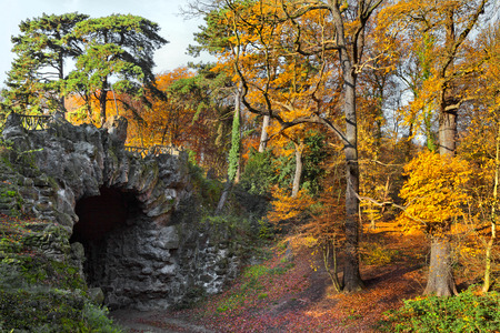 Beautiful grotto in the autumn park. Autumn landscape.の写真素材