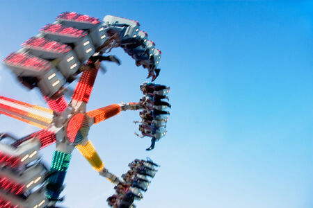 Amusement Park. The rapid rotation. Blurred motion.の写真素材