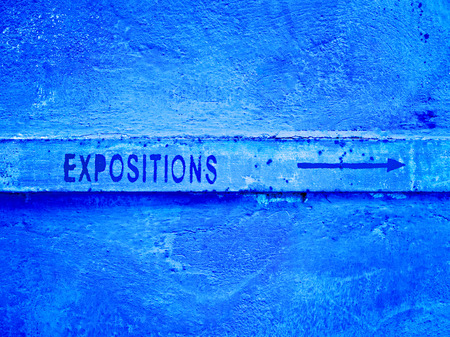 Cement wall with the index of the exhibition. Abstract background.