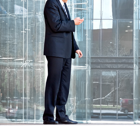 Businessman talking on the phone. Urban scene.の写真素材