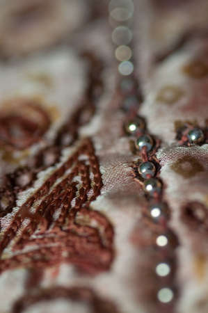 Closeup of intricate details in Indian wedding fabricsの写真素材