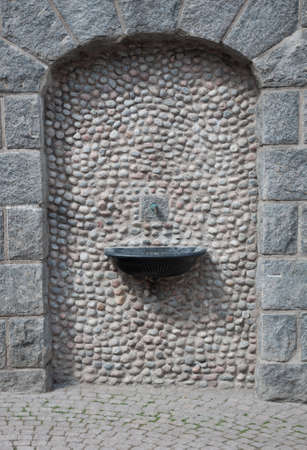 Detail of stone wall with fountain in Vallingby, 1950の写真素材