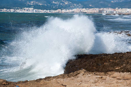 Splashing wave in Palma bay, Mallorca  の写真素材
