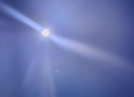 Shining romantic moon and beams as background.の写真素材