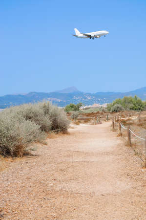 Jetliner landing in Son Sant Joan, airport of Palma de Mallorcaの写真素材