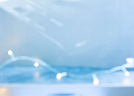 Light strand defocused on light blue background with copy space の写真素材