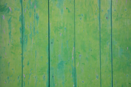 Green vintage painted and grungy wood wall の写真素材