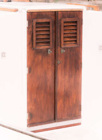 Classical boats vintage style detail - wood cabin door, Mallorca, Balearic islands, Spain 