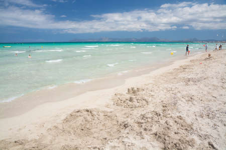 Vast sandy beach with emerald crystal clear water  Playa de Muro, Mallorca, Balearic islands, Spain のeditorial素材