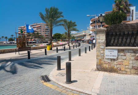 Cala Estancia street, blue flag beach and tourism. Mallorca, Balearic islands, Spain in July.のeditorial素材