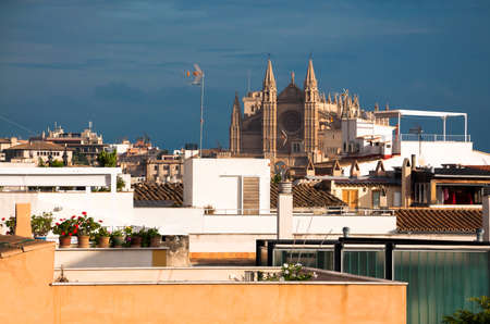 PALMA, MAJORCA - NOVEMBER 15, 2011: Cathedral view over the roof tops seen from Santa Catalina on November 15 2011 in Palma de Mallorca, Balearic islands, Spain.のeditorial素材