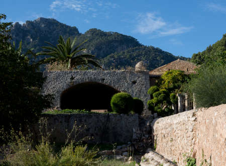 ALFABIA GARDENS, MAJORCA, SPAIN - OCTOBER 25 2013: Gardens and mountain view on October 25 2013, Alfabia gardens, Mallorca, Spain.のeditorial素材