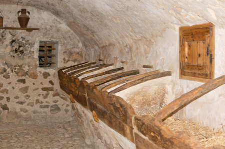 ALFABIA GARDENS, MAJORCA, SPAIN - OCTOBER 25 2013: Cattle feeder in Alfabia gardens on October 25 2013, Alfabia gardens, Mallorca, Spain.のeditorial素材