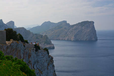 CAP FORMENTOR, MAJORCA, SPAIN - OCTOBER 28 2013: Breathtaking Mediterranean vistas and steep hairpin bends with only a decent amount of tourists on October 28 2013 in Cape Formentor, Majorca, Spain.のeditorial素材