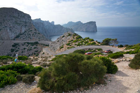 CAP FORMENTOR, MAJORCA, SPAIN - OCTOBER 28 2013: Breathtaking Mediterranean vistas and steep hairpin bends with only a decent amount of tourists on October 28 2013 in Cape Formentor, Majorca, Spain.のeditorial素材