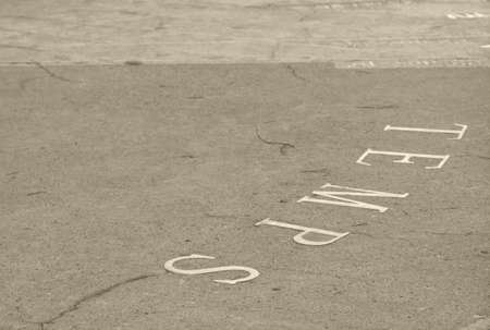 CAMP DE MAR, MAJORCA, SPAIN - OCTOBER 30 2013: Detail of the sundial sculpture with the word TEMPS (time or season) on October 30 2013 in Camp de Mar, Mallorca, Balearic islands, Spain in October. Artist unknown.のeditorial素材