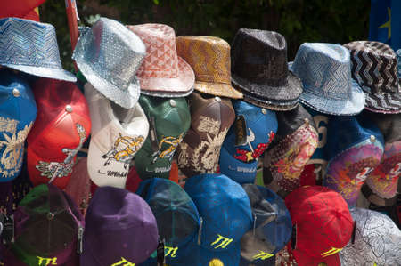 Hats on display in market booth in Torrevieja, Spain in July 2012のeditorial素材