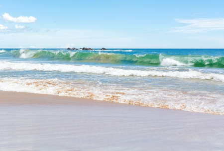 Green wave on sandy beach near Tangalle, Southern Province, Sri Lanka, Asia.の写真素材