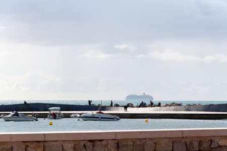 CALA ESTANCIA, MAJORCA, SPAIN - FEBRUARY 15, 2013; Film crew on location shooting skateboarding...