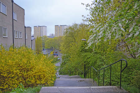 Fifties architecture and stairs with typical black smithwork railing on May 8, 2014 in Vallingby, Stockholm, Sweden.のeditorial素材