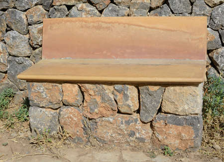 Park bench in drystone technique and terracotta.の写真素材