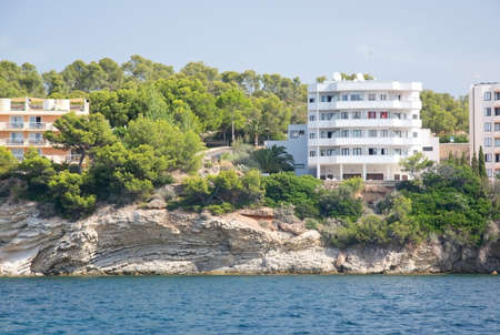 MAJORCA COAST, BALEARIC ISLANDS, SPAIN - JULY 19, 2014: Hotel between Santa Ponsa and Peguera on July 19, 2014 in Majorca, Spain.のeditorial素材