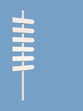 White wooden rustic sign post with six arrows on blue and empty space for text, maritime or beach...