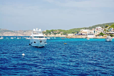 MALLORCA, BALEARIC ISLANDS, SPAIN - JULY 19, 2014: Boats moored in bay on July 19 2014 in southwestern Mallorca, Balearic islands, Spain.のeditorial素材