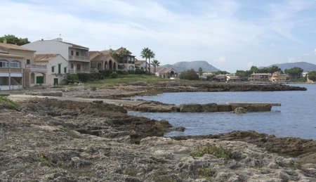 ALCUDIA, MAJORCA, SPAIN - OCTOBER 24, 2013: Beach property in Barcares, north Mallorca, Balearic islands, Spain in October.のeditorial素材