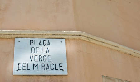 Street sign by Miracle Place - Placa de la Verge del Miracle - in Santa Catalina. Palma de Mallorca, Balearic islands, Spain.の写真素材