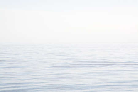 Blurry sea and sky background in Falkenberg Sweden in afternoon sunlight.の写真素材