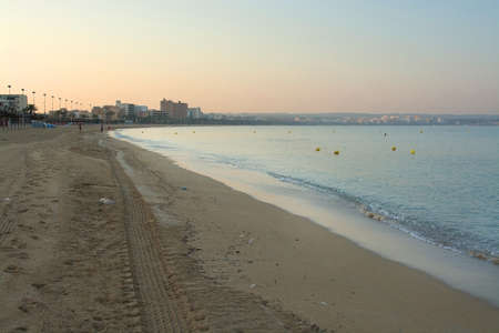 CAN PASTILLA, MAJORCA, BALEARIC ISLANDS, SPAIN - JULY 21, 2015:  Empty Playa de Palma beach before...