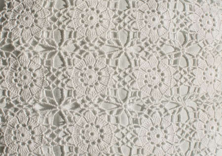 White crochet pattern with flower circles backgroundの写真素材