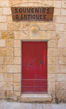 Red wooden door. Painted doors of Malta series.の写真素材