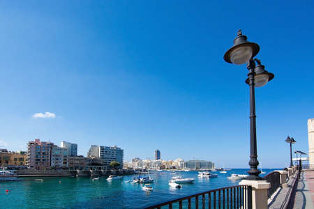 ST JULIANS, MALTA - SEPTEMBER 13, 2015: Water view in St Julians of both Balluta and Spinola bay on a sunny summer day on September 13, 2015 in St Julians, Malta.のeditorial素材