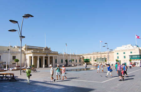 VALLETTA, MALTA - SEPTEMBER 15, 2015: Main square of the capital with its magnificent Il-Palazz tal-Gran Mastru a sunny day in September 15, 2015 in Valletta, Malta.のeditorial素材