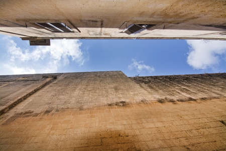 Old buildings and blue sky inside old city walls on a sunny day in Mdina, Malta.の写真素材