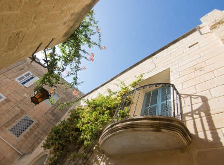 MDINA, MALTA - SEPTEMBER 15, 2015: Mdina architecture details inside old city walls on a sunny day on September 14, 2015 in Mdina, Malta.のeditorial素材