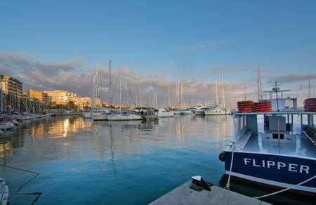 PALMA, MALLORCA, BALEARIC ISLANDS, SPAIN - DECEMBER 22, 2015: Palma marina boats moored along the...
