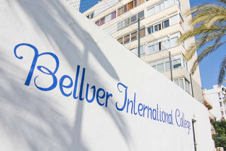 CALA MAYOR, MAJORCA, SPAIN - DECEMBER 19, 2015: Bellver International College painted on white wall on December 19, 2015 in Cala Mayor, Majorca, Balearic islands, Spainのeditorial素材