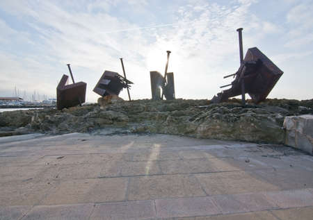 CALA ESTANCIA, PALMA DE MALLORCA, SPAIN - DECEMBER 14, 2015: Iron sculpture VENT at the marina on a gray winter day on December 14, 2015 in Cala Estancia, Balearic islands, Spainのeditorial素材