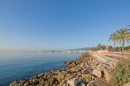 PALMA DE MALLORCA, BALEARIC ISLANDS, SPAIN - DECEMBER 22, 2015: Seaside coastal landscape with rocks on December 22, 2015 in Palma de Mallorca, Balearic islands, Spainのeditorial素材