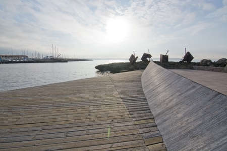 CALA ESTANCIA, PALMA DE MALLORCA, SPAIN - DECEMBER 14, 2015: Iron sculpture VENT at the marina on a gray winter day on December 14, 2015 in Cala Estancia, Balearic islands, Spainのeditorial素材