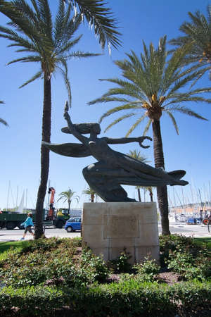 PALMA DE MALLORCA, BALEARIC ISLANDS, SPAIN - APRIL 13, 2016: Public art stone sculpture 'Spirit of the islands', Genie de les Illes, in a park on Paseo Maritimo in Palma de Mallorca, Balearic islands, Spain on April 13, 2016.のeditorial素材