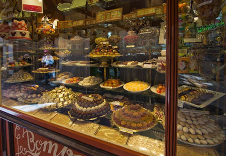 PALMA DE MALLORCA, BALEARIC ISLANDS, SPAIN - APRIL 13, 2016: Bomboneria window display in an Old Town shopping street is one of the oldest shops in Palma de Mallorca, Balearic islands, Spain on April 13, 2016.のeditorial素材