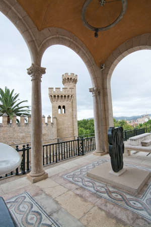 PALMA DE MALLORCA, BALEARIC ISLANDS, SPAIN - JULY 14, 2016: Museu March sculpture garden and neoclassical architecture with a view to Almudaina castle on July 14, 2016 in Palma de Mallorca, Balearic islands, Spain.のeditorial素材