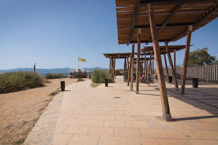 MOLINAR, MALLORCA, BALEARIC ISLANDS, SPAIN - JULY 30, 2016:  Small beach hut cafe along outdoor bicycling track on a sunny day on July 30, 2016 in Palma de Mallorca, Balearic islands, Spain.のeditorial素材