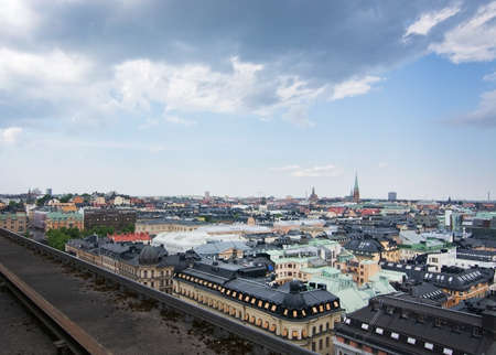 STOCKHOLM, SWEDEN - JUNE 3, 2016: High angle cityscape with highrises and medieval churches in Stockholm, Sweden on June 3, 2016.のeditorial素材