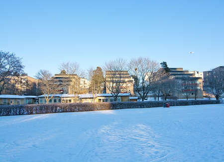 VALLINGBY, STOCKHOLM, SWEDEN - JANUARY 6, 2016: Vallingby park architecture and airplane outside on a sunny winter day on January 6, 2016 in Vallingby, Stockholm, Sweden.のeditorial素材